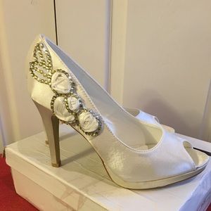 Ivory satin with peep toes and platform / rhinestone embellished/ never worn